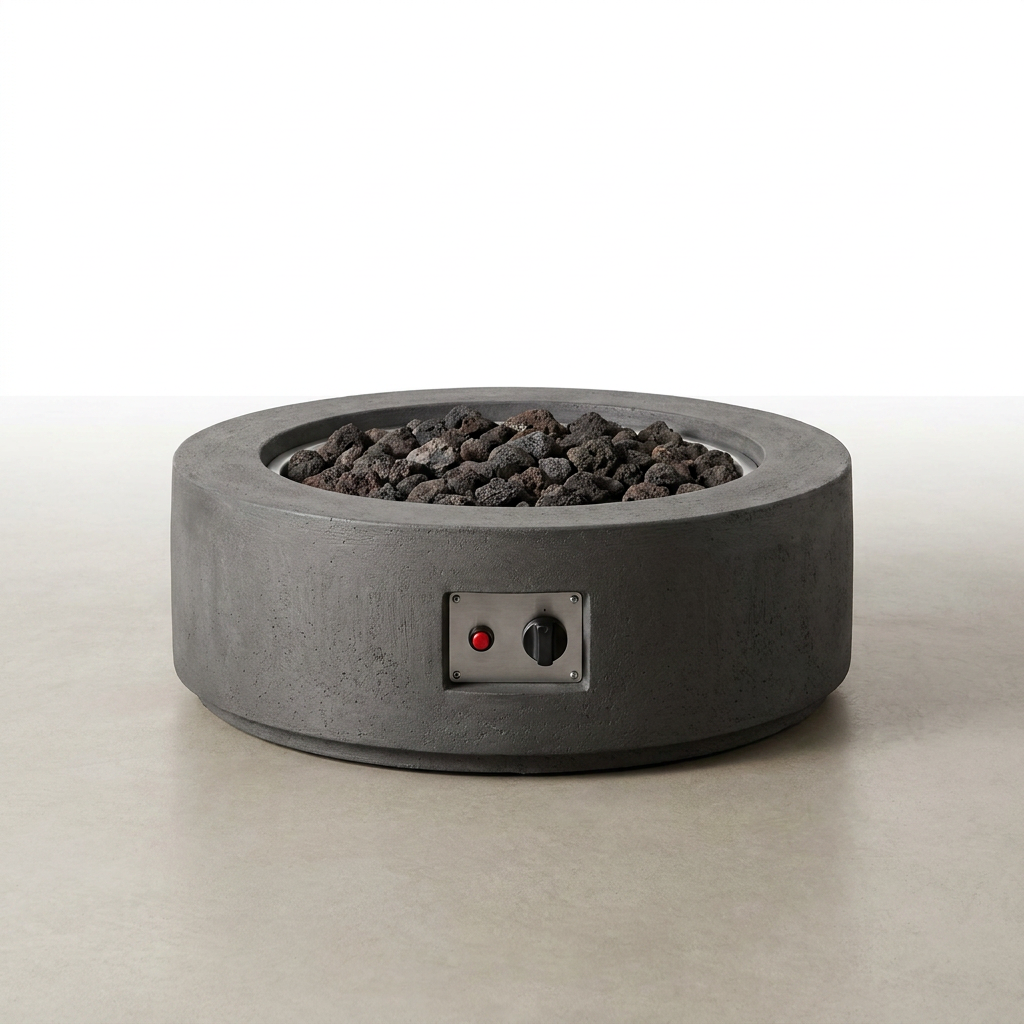 Brookhurst 43 In. W X 13 In. H round Outdoor GFRC Liquid Propane Fire Pit in Carbon with Lava Rocks — Studio Shot