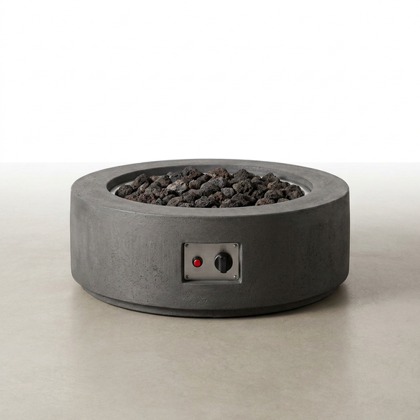 Brookhurst 43 In. W X 13 In. H round Outdoor GFRC Liquid Propane Fire Pit in Carbon with Lava Rocks — Studio Shot
